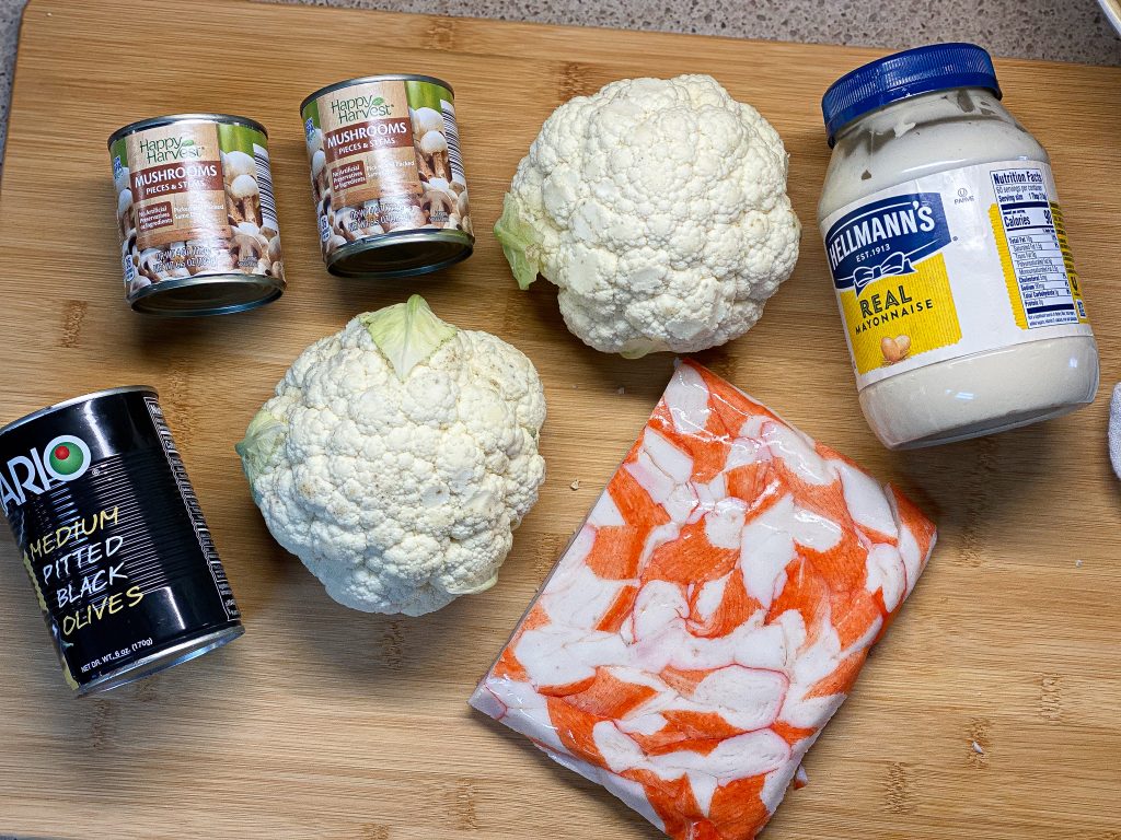ingredients laid out to make easy cauliflower crab salad